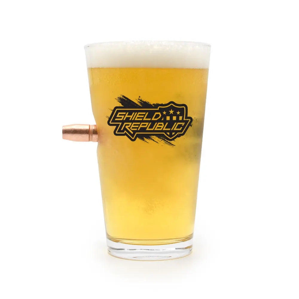 Wooden Spoon Survivor - 50 Cal Pint Glass Shield Republic