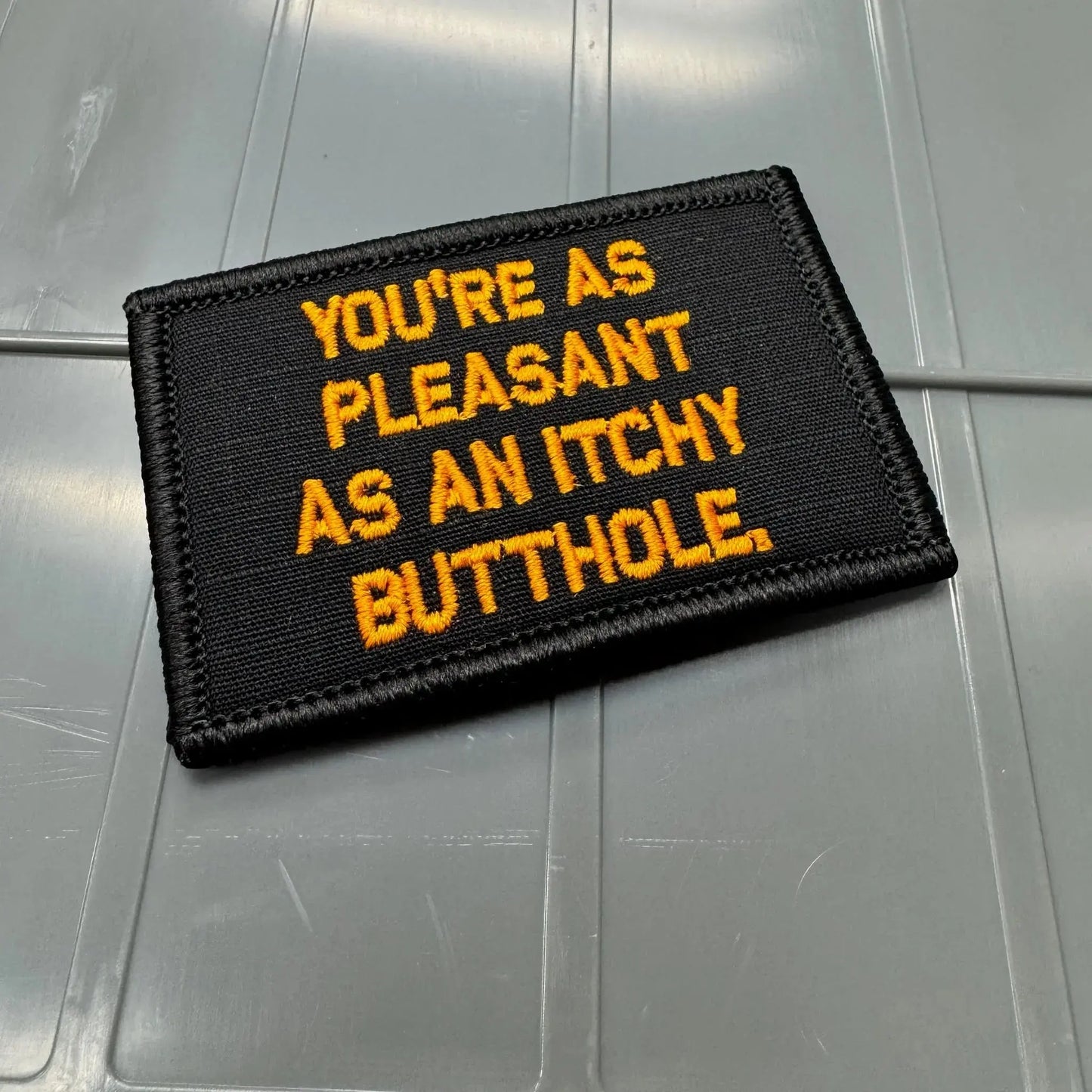As Seen on Socials - You're As Pleasant As An Itchy Butthole - Black w/Orange Tactical Gear Junkie