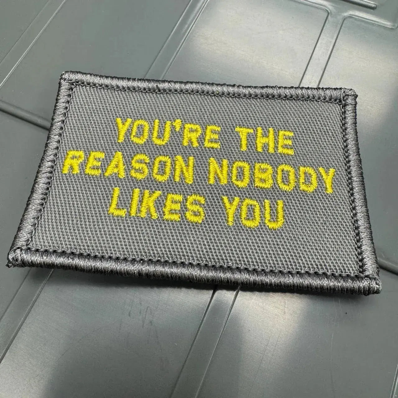 As Seen on Socials - You're The Reason Nobody Likes You - 2x3 Patch - Gray w/Yellow Tactical Gear Junkie
